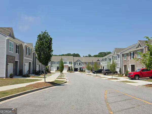 a view of a street with buildings