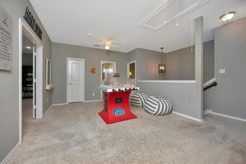 a view of entryway with stairs and wooden floor