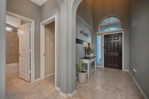 a view of livingroom with furniture and window