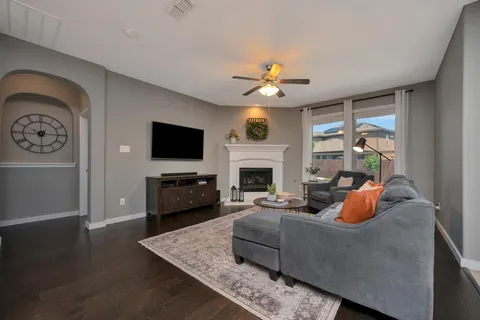 a dining room with furniture and window