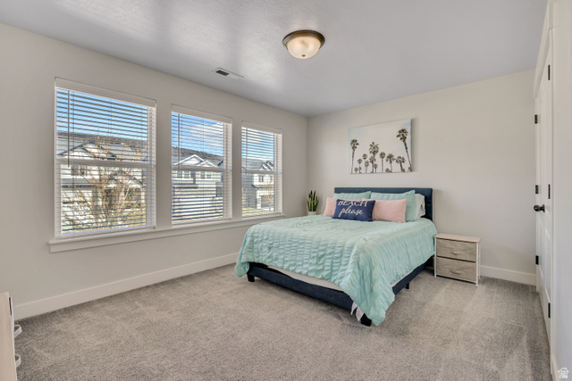 1577 Quailhill Road Saratoga Springs, UT 84045 - Photo 24 of 46 Bedroom with light carpet
