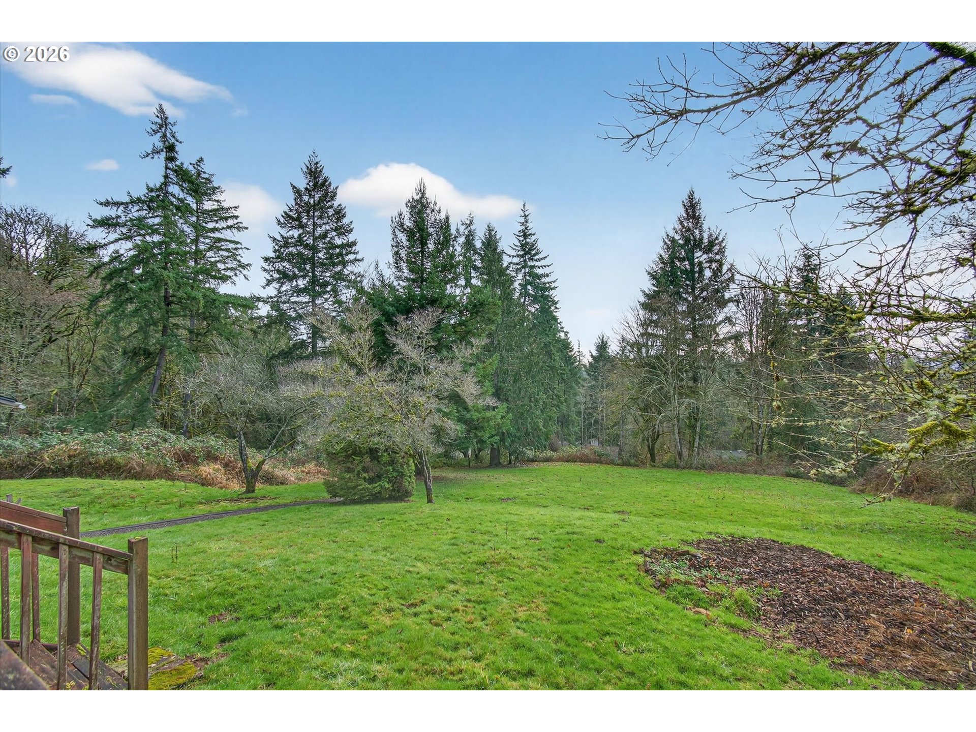 919 Cascade Drive Longview, WA 98632 - Photo 28 of 33 a view of grassy field with trees