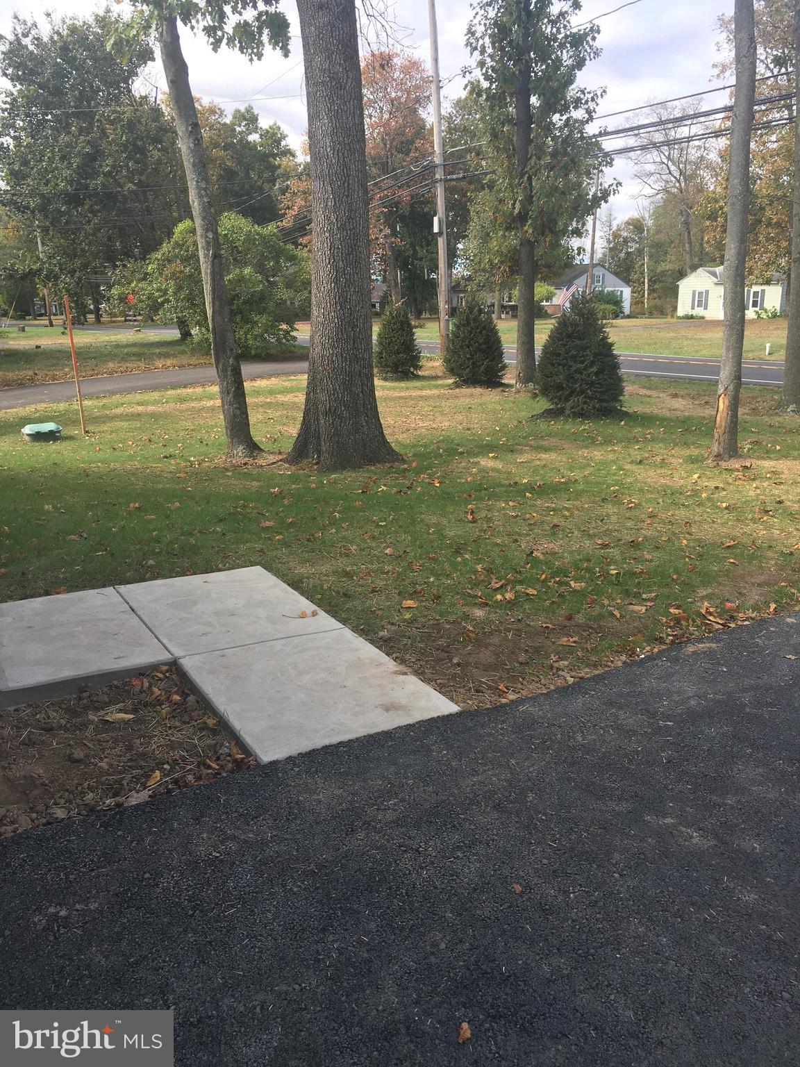1011 North Ridge Road Perkasie, PA 18944 - Photo 2 of 31 Front lawn and trees