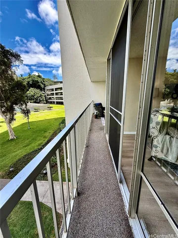 a view of a golf course with a lake
