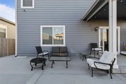 a building outdoor space with patio furniture