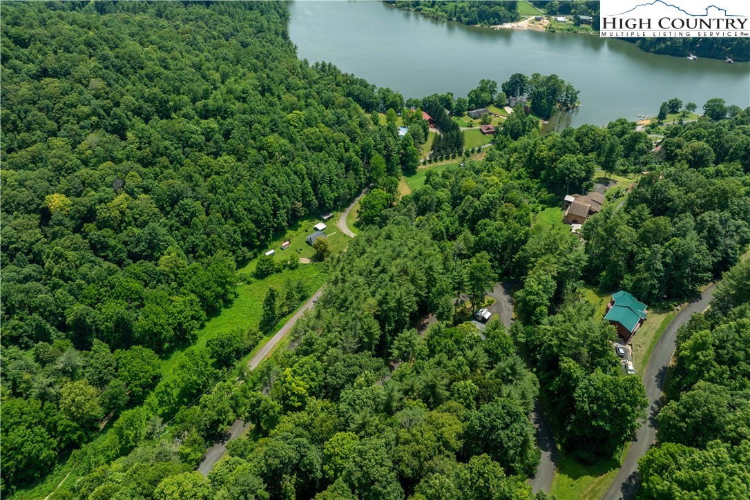 Lot 1 Lake Ridge Butler, TN 37640 - Photo 12 of 24 an aerial view of a house with a yard and lake view