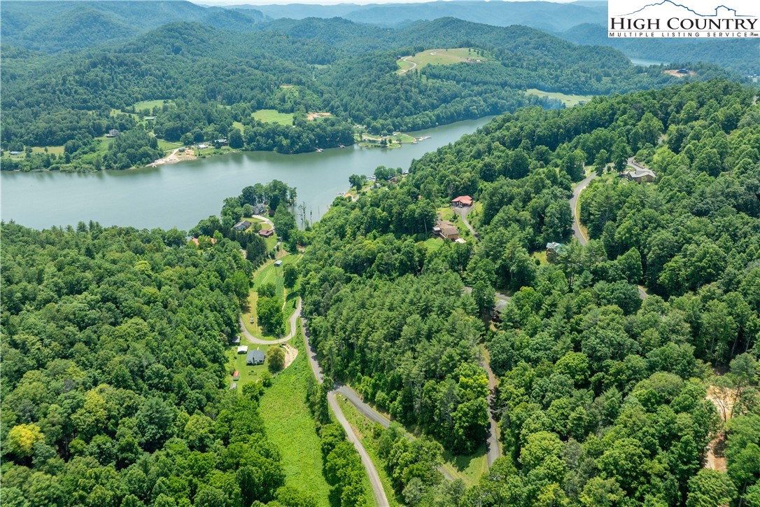 Lot 1 Lake Ridge Butler, TN 37640 - Photo 8 of 24 an aerial view of residential house with outdoor space and trees all around