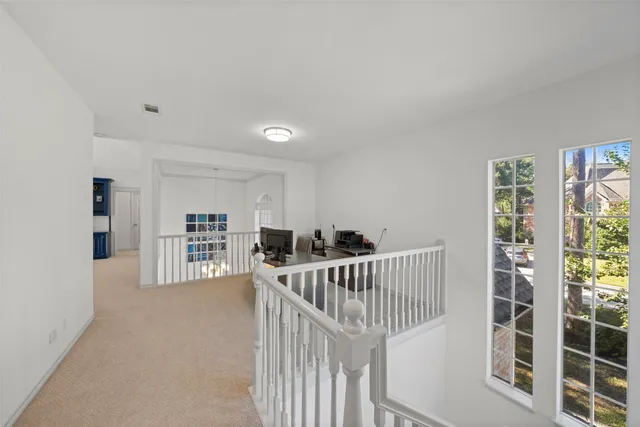 a view of livingroom with furniture and windows