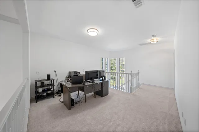 a room with furniture and a chandelier