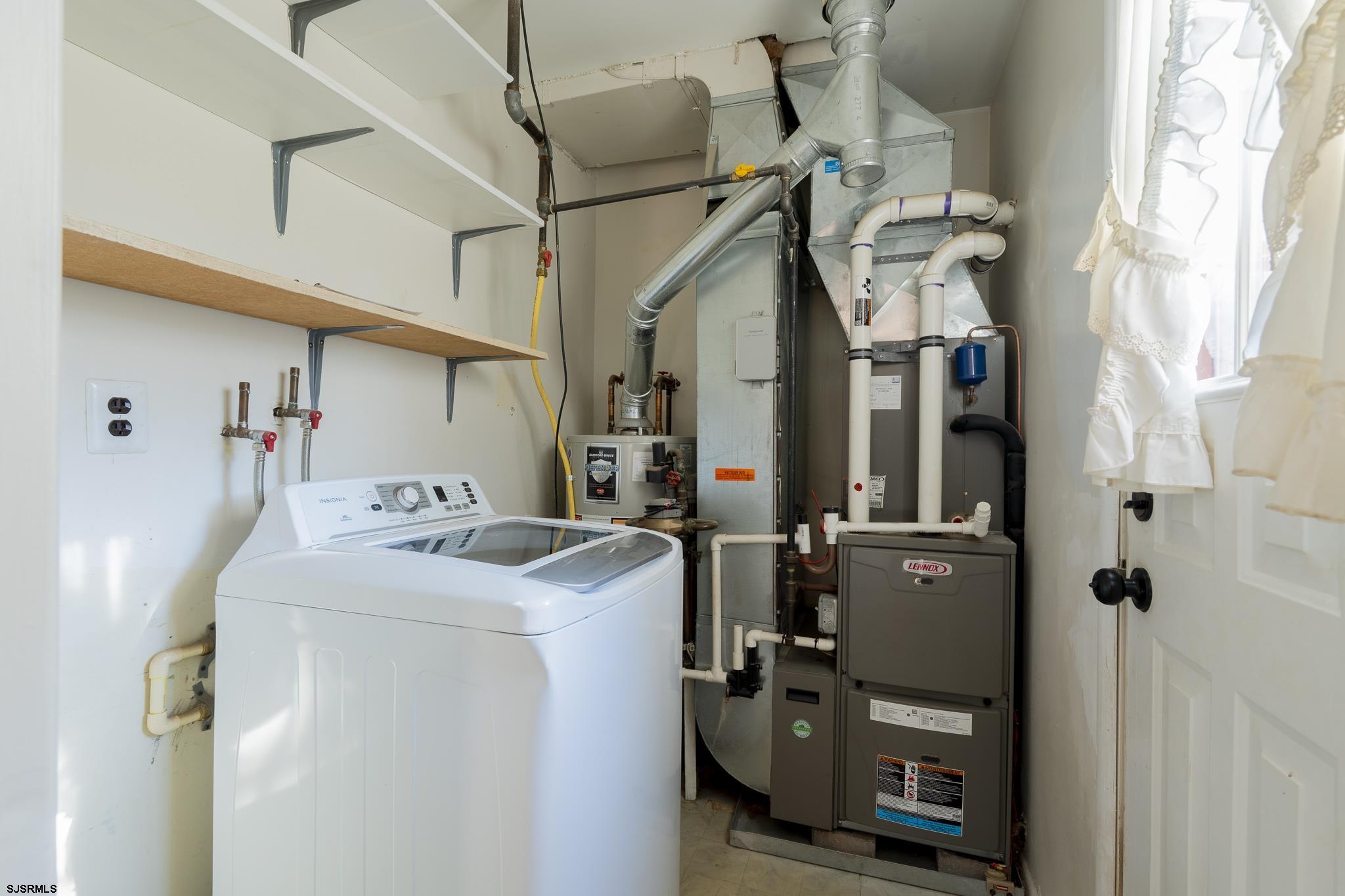 1137 South Beecham Road Williamstown, NJ 08094 - Photo 15 of 47 a utility room with dryer and washer