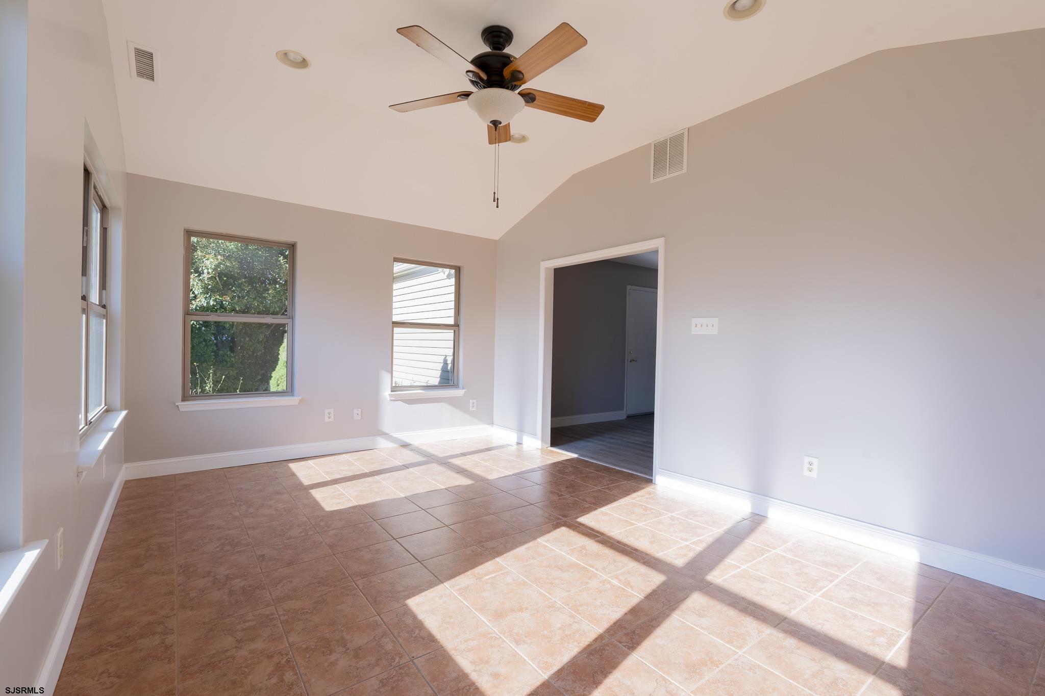 1137 South Beecham Road Williamstown, NJ 08094 - Photo 17 of 47 a view of an empty room with a window