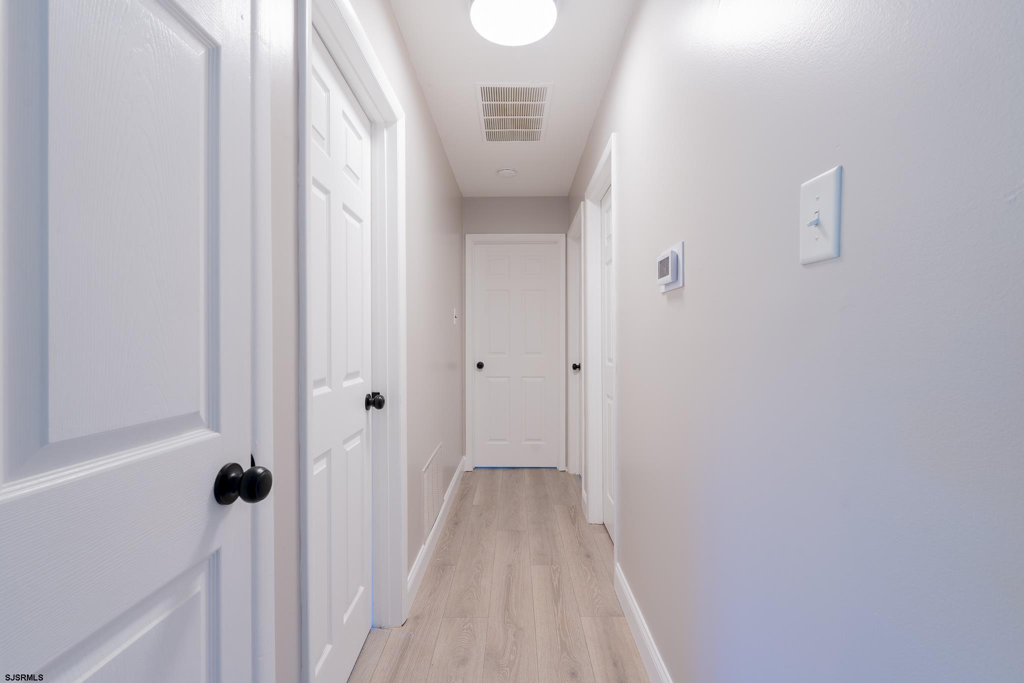 1137 South Beecham Road Williamstown, NJ 08094 - Photo 19 of 47 a view of a bathroom from a hallway