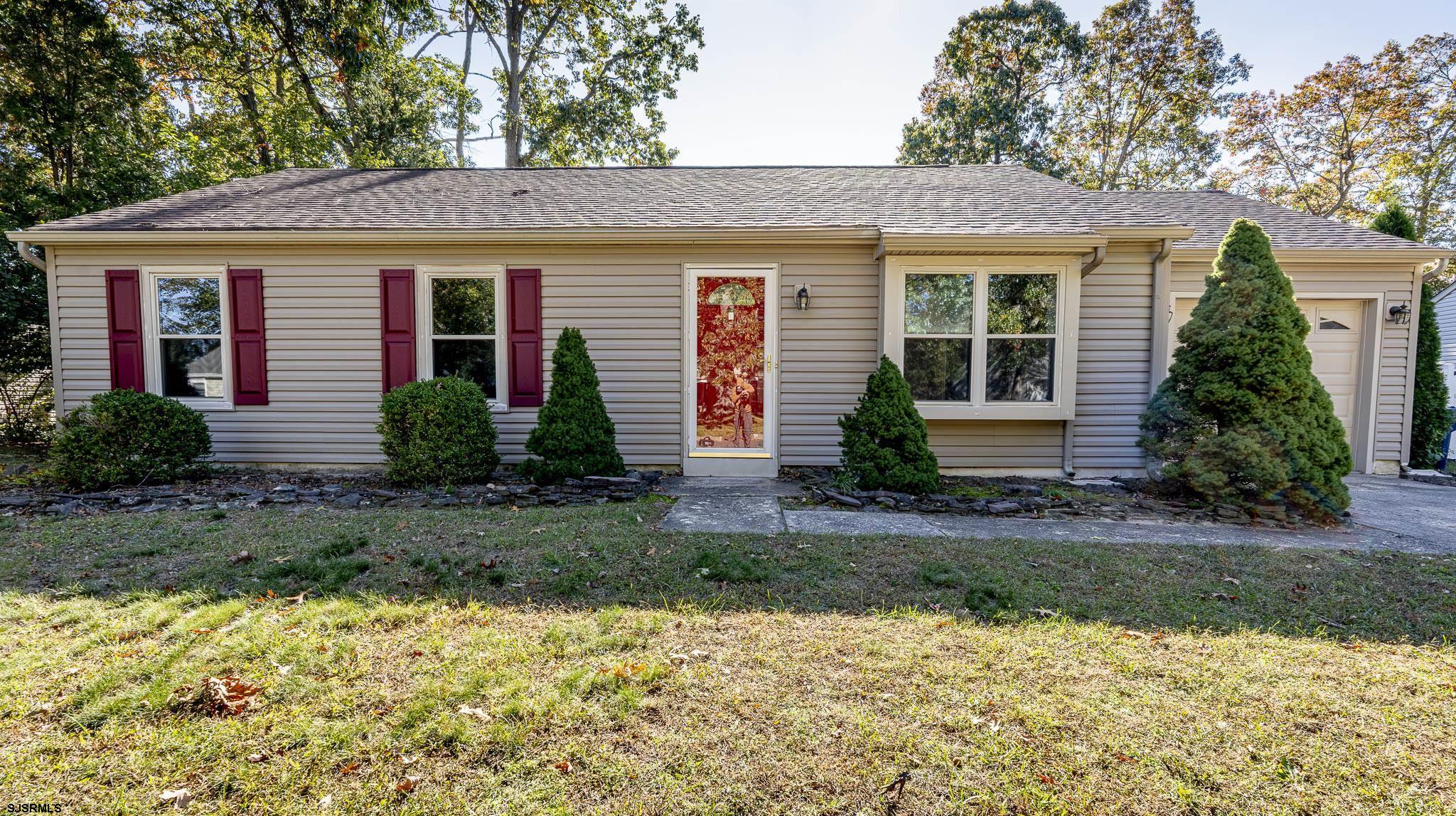 1137 South Beecham Road Williamstown, NJ 08094 - Photo 2 of 47 a front view of a house with garden