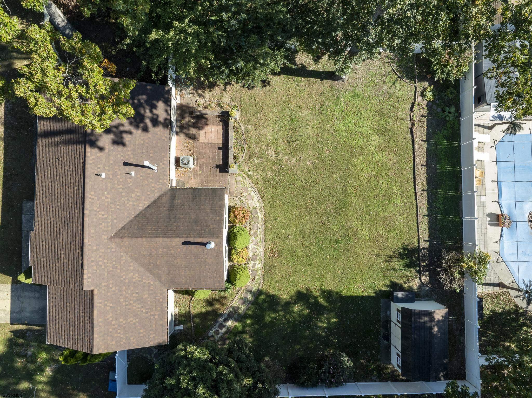 1137 South Beecham Road Williamstown, NJ 08094 - Photo 3 of 47 an aerial view of a house with a yard