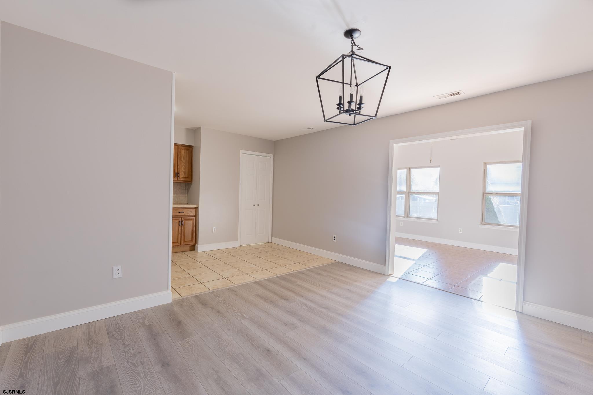 1137 South Beecham Road Williamstown, NJ 08094 - Photo 10 of 47 wooden floor in an empty room with a window