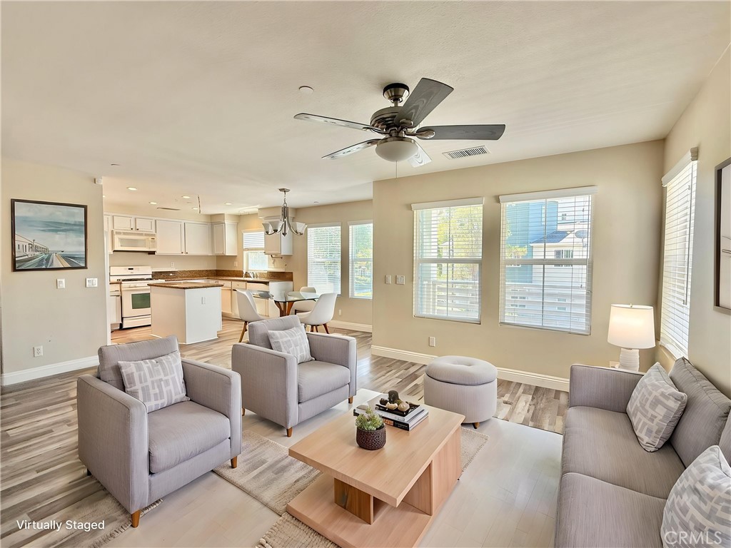 5 Quartz Lane Ladera Ranch, CA 92694 - Photo 6 of 55 Virtually staged dining and living area - looking toward kitchen