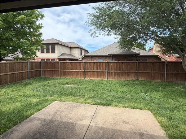 a view of a backyard with a garden