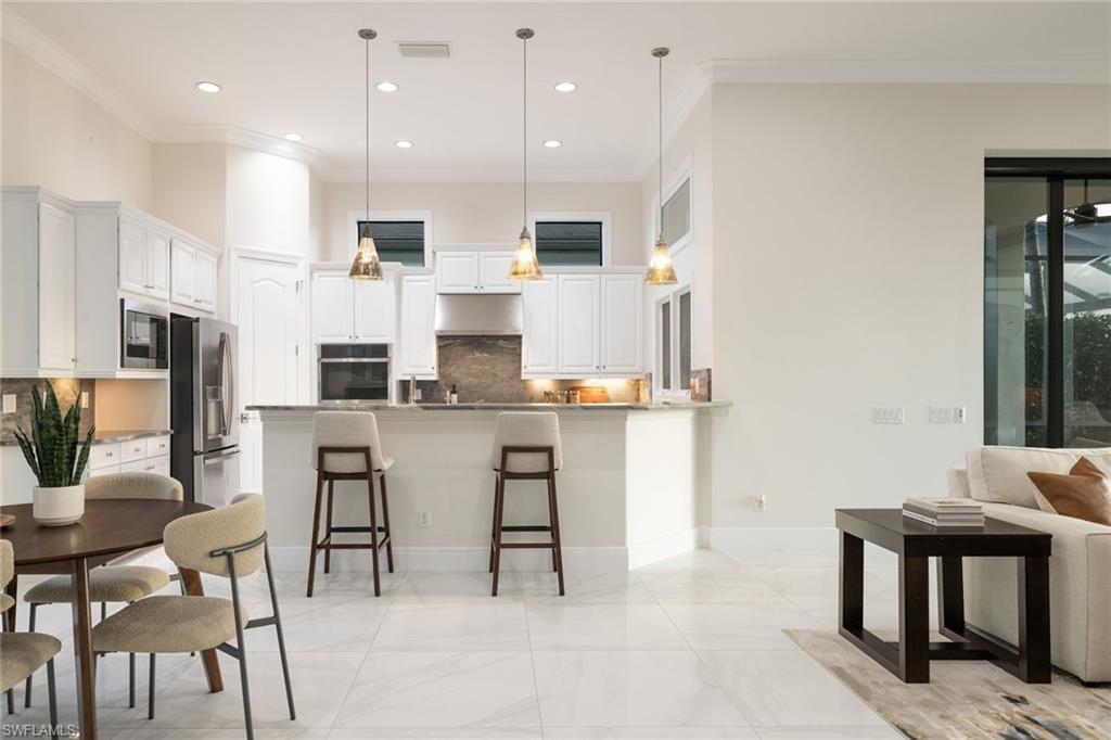 16725 Cabreo Drive Naples, FL 34110 - Photo 12 of 50