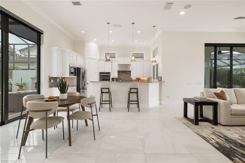 16725 Cabreo Drive Naples, FL 34110 - Photo 9 of 50