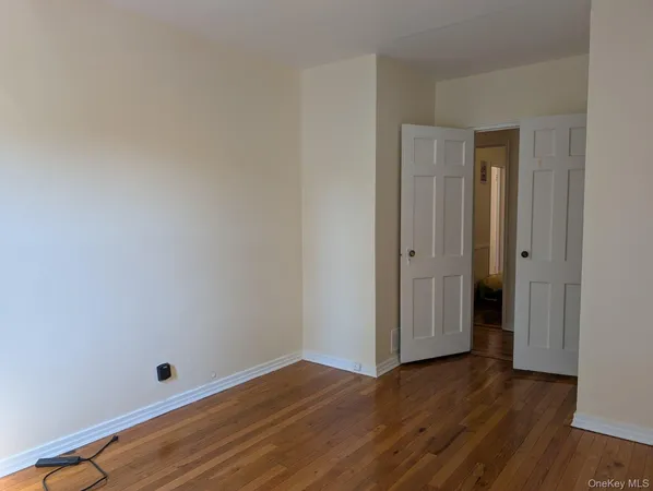 a view of bathroom with wooden floor