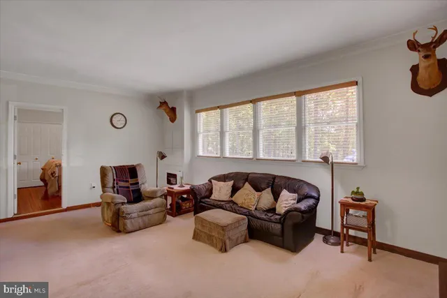 a room with furniture and wooden floor
