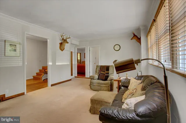 a bedroom with a bed and a sink