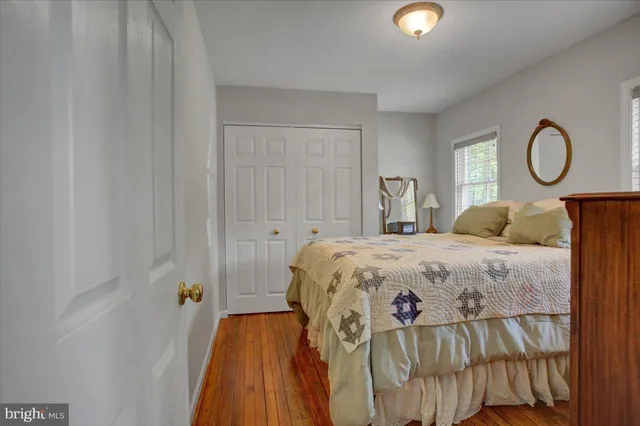 a black and white photo of a refrigerator