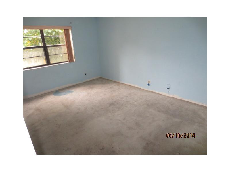 9273 Southwest 8th Street, Unit 210 Boca Raton, FL 33428 - Photo 11 of 12 Exterior Front