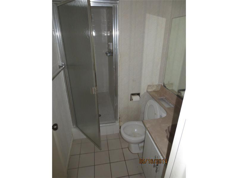 9273 Southwest 8th Street, Unit 210 Boca Raton, FL 33428 - Photo 10 of 12 Exterior Front