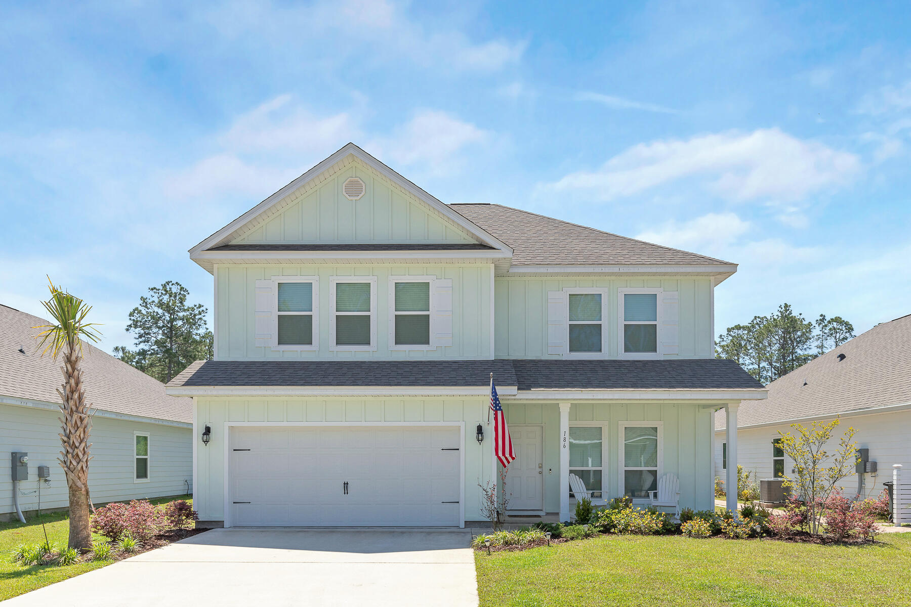 186 Southern Pnes Road Santa Rosa Beach, FL 32459 - Photo 1 of 32 a front view of a house with a yard