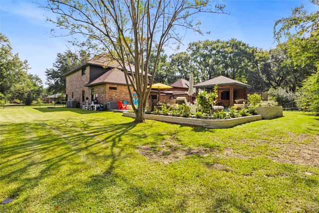 $710,000 | 10 Holly Tree Lane, Spring, TX 77373