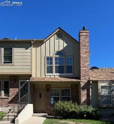 a view of a building with a window and balcony