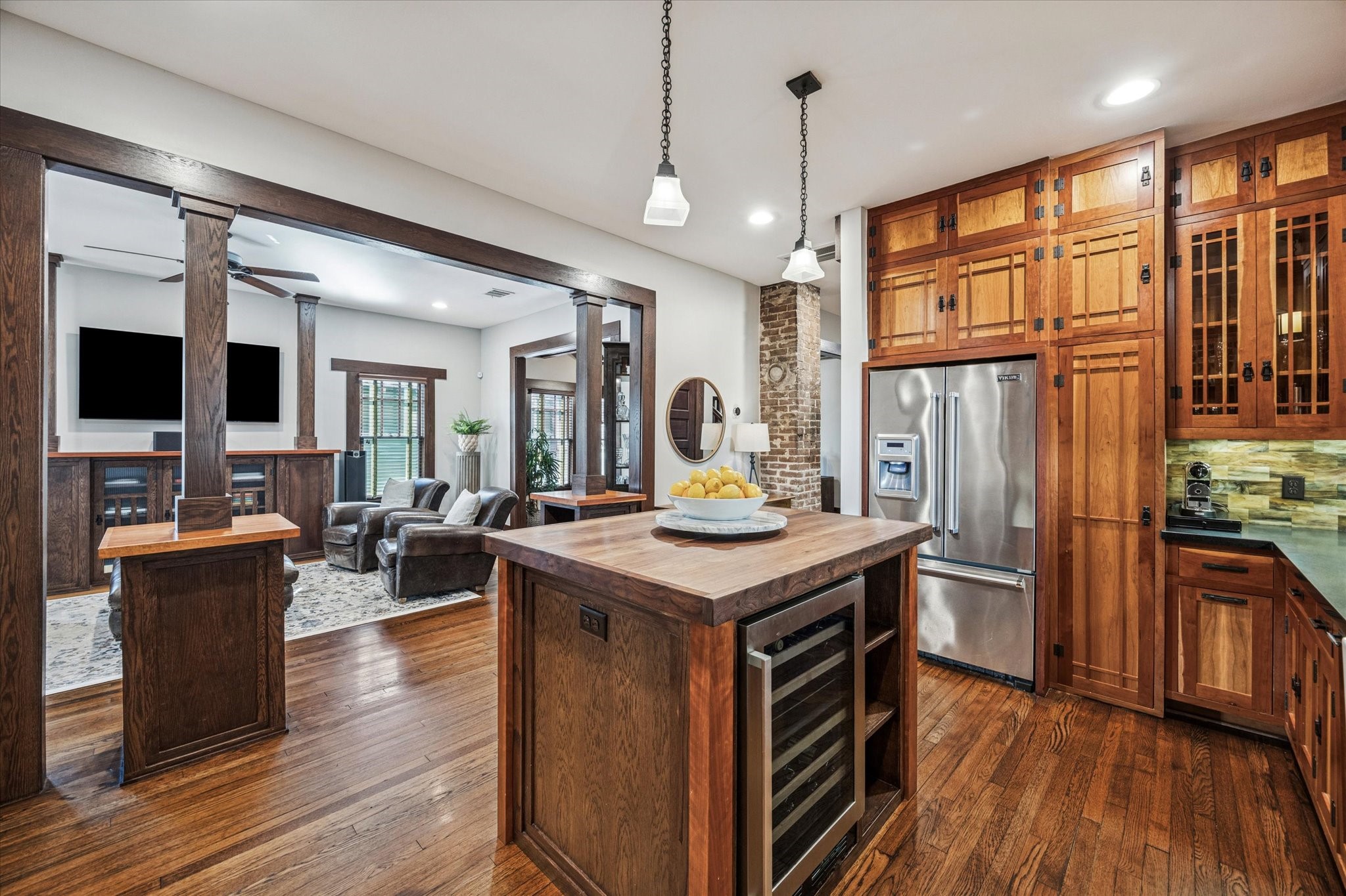 512 Archer Street Houston, TX 77009 - Photo 14 of 40 The hardwood custom island features a wood countertop and houses a dual temperature wine refrigerator.