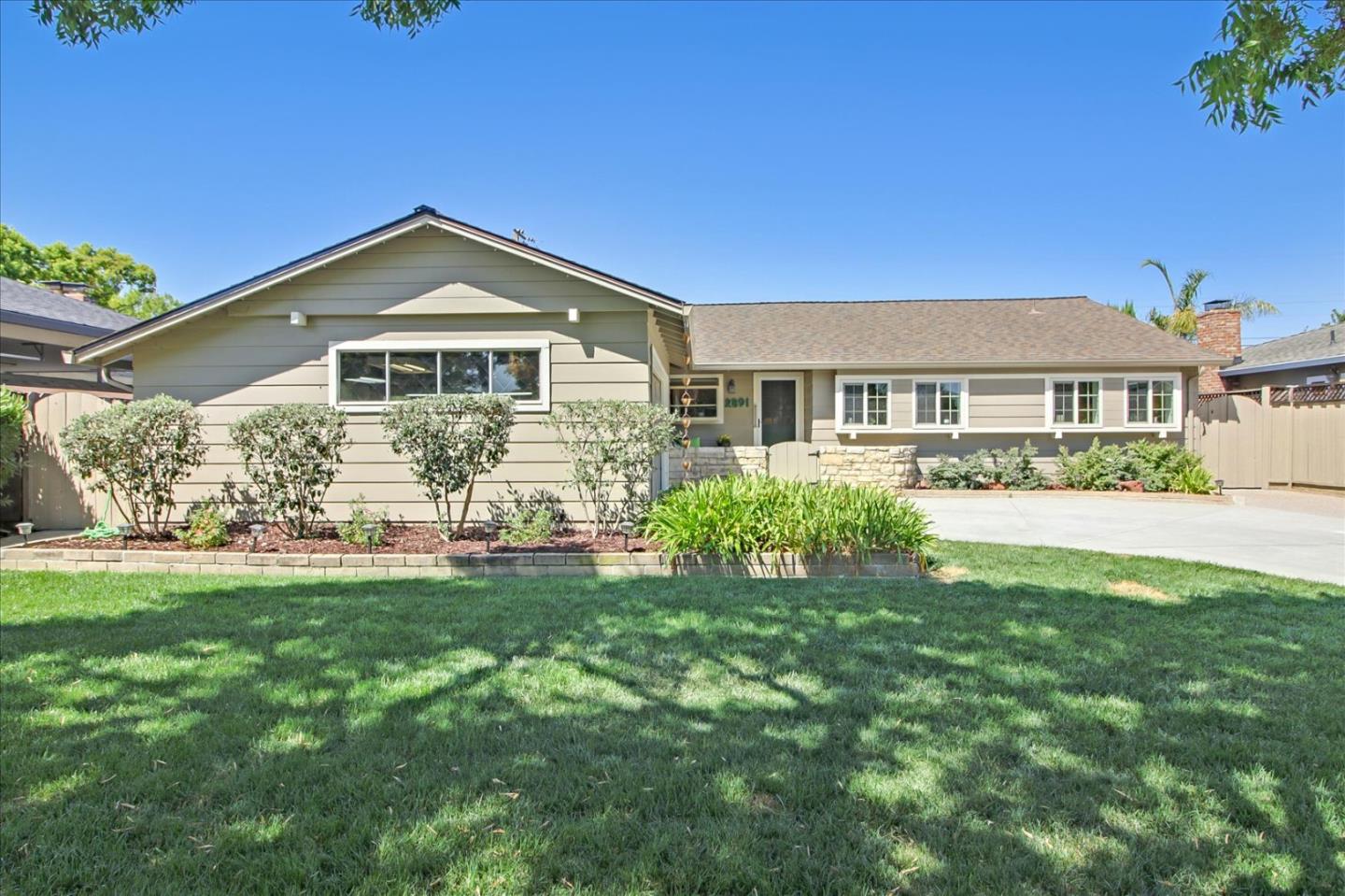 2891 Benjamin Avenue San Jose, CA 95124 - Photo 1 of 31 a front view of a house with a yard