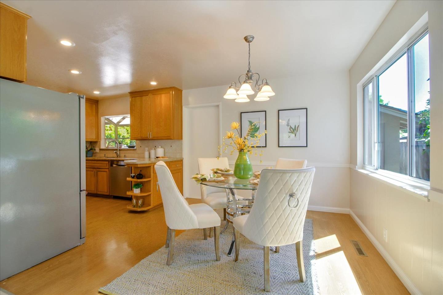2891 Benjamin Avenue San Jose, CA 95124 - Photo 15 of 31 a view of a dining room with furniture and chandelier