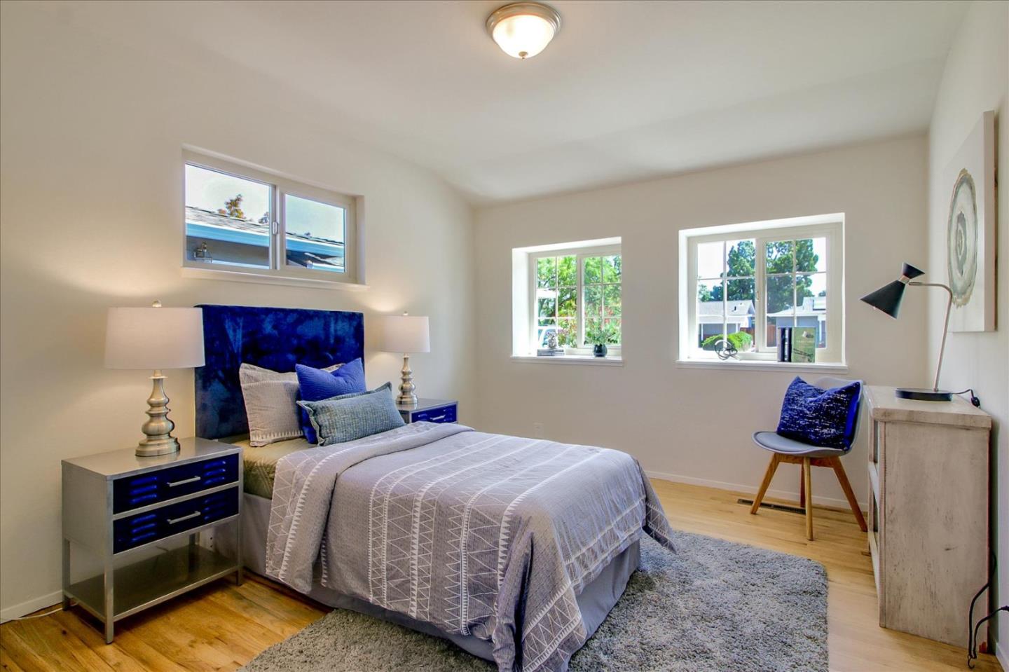 2891 Benjamin Avenue San Jose, CA 95124 - Photo 18 of 31 a bed room with a bed and a chair