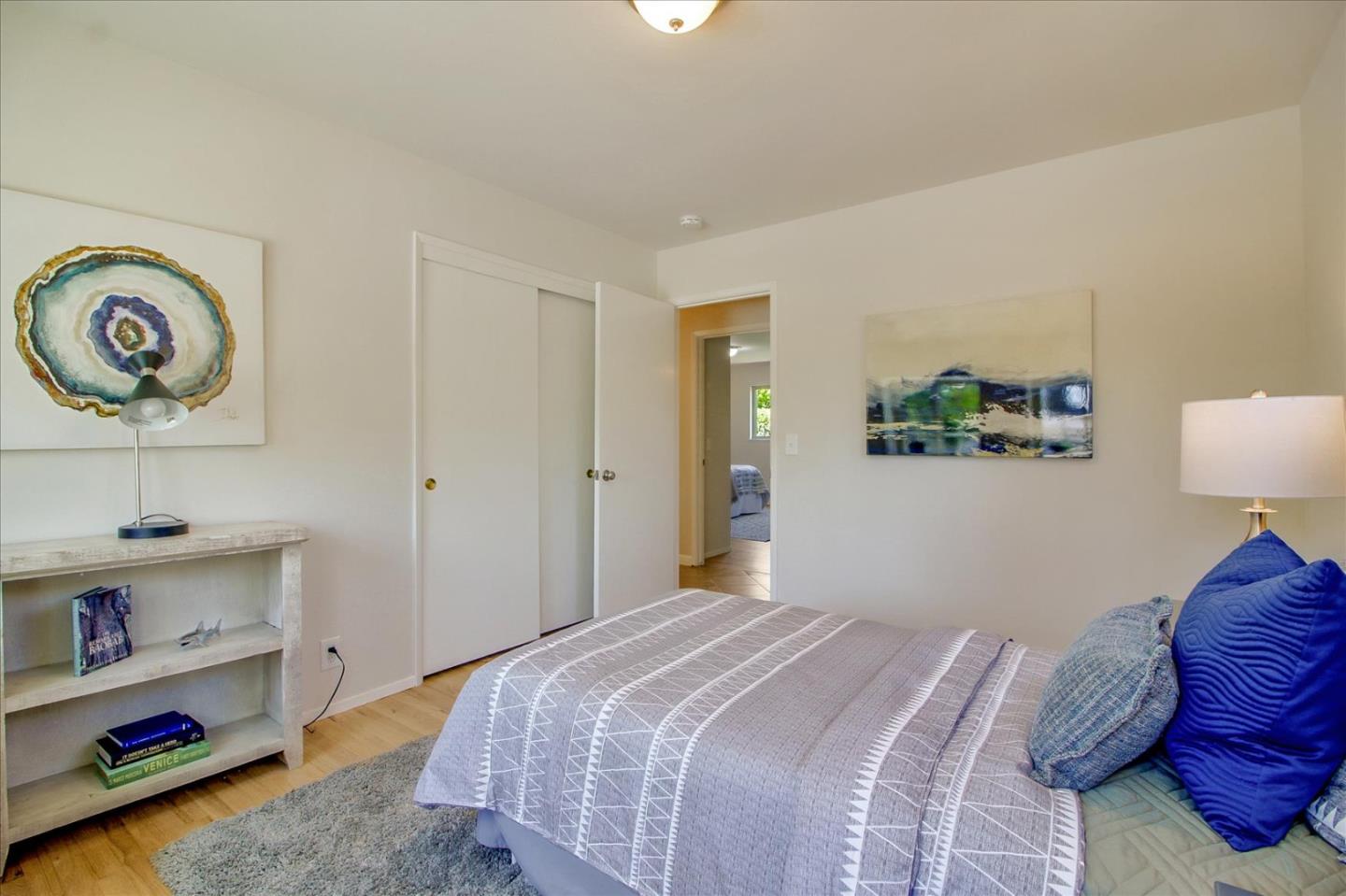 2891 Benjamin Avenue San Jose, CA 95124 - Photo 19 of 31 a bedroom with a bed and a potted plant