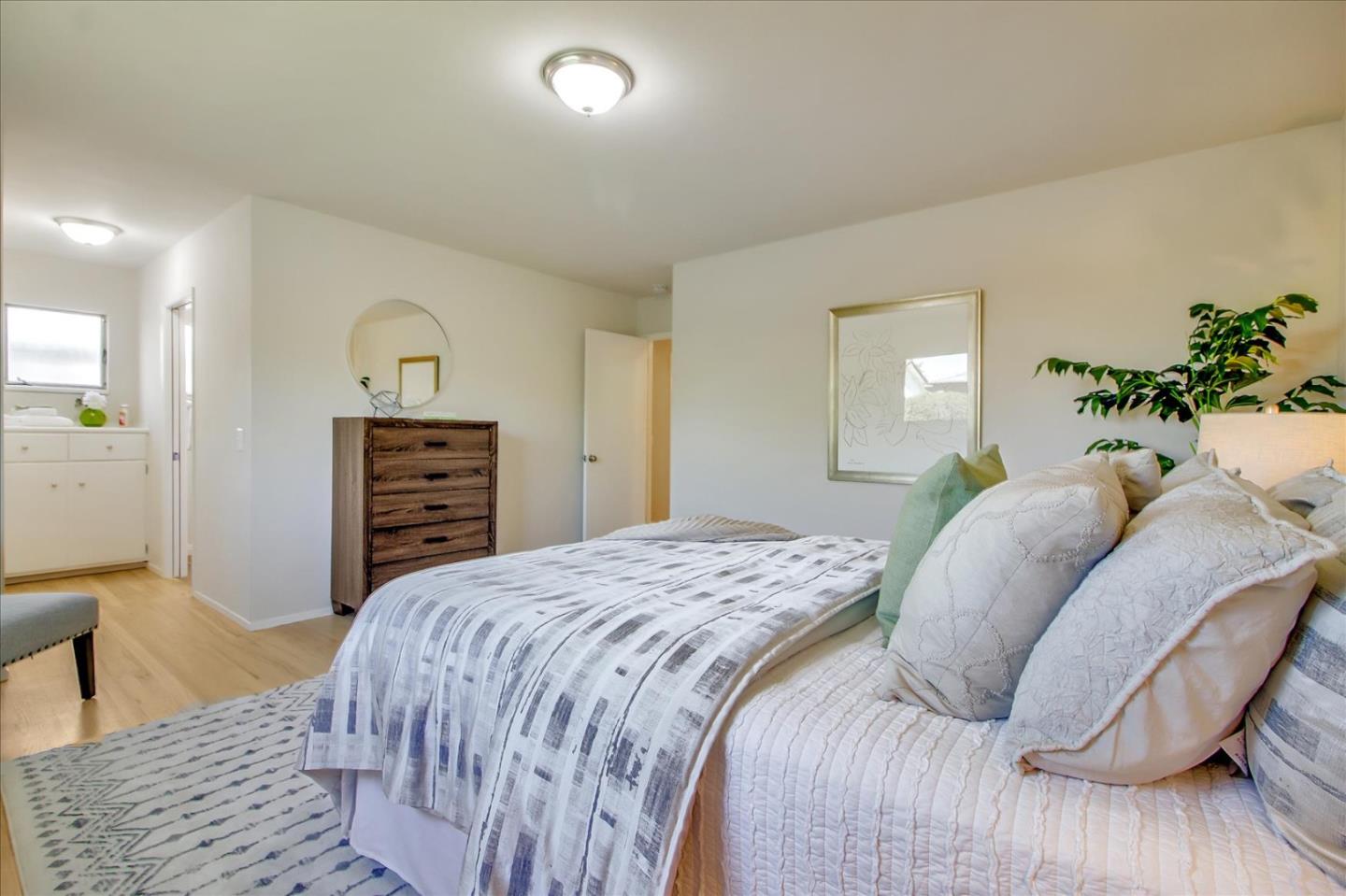 2891 Benjamin Avenue San Jose, CA 95124 - Photo 21 of 31 a bedroom with a bed and a dresser