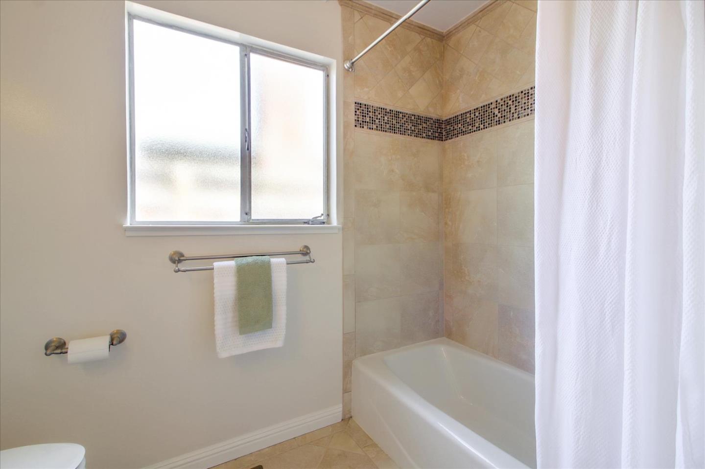 2891 Benjamin Avenue San Jose, CA 95124 - Photo 24 of 31 a bathroom with a bathtub and a shower