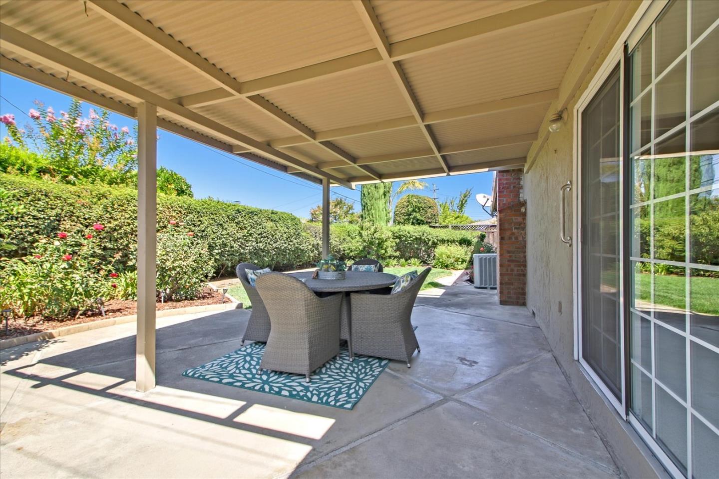 2891 Benjamin Avenue San Jose, CA 95124 - Photo 28 of 31 a view of a patio with table and chairs potted plants