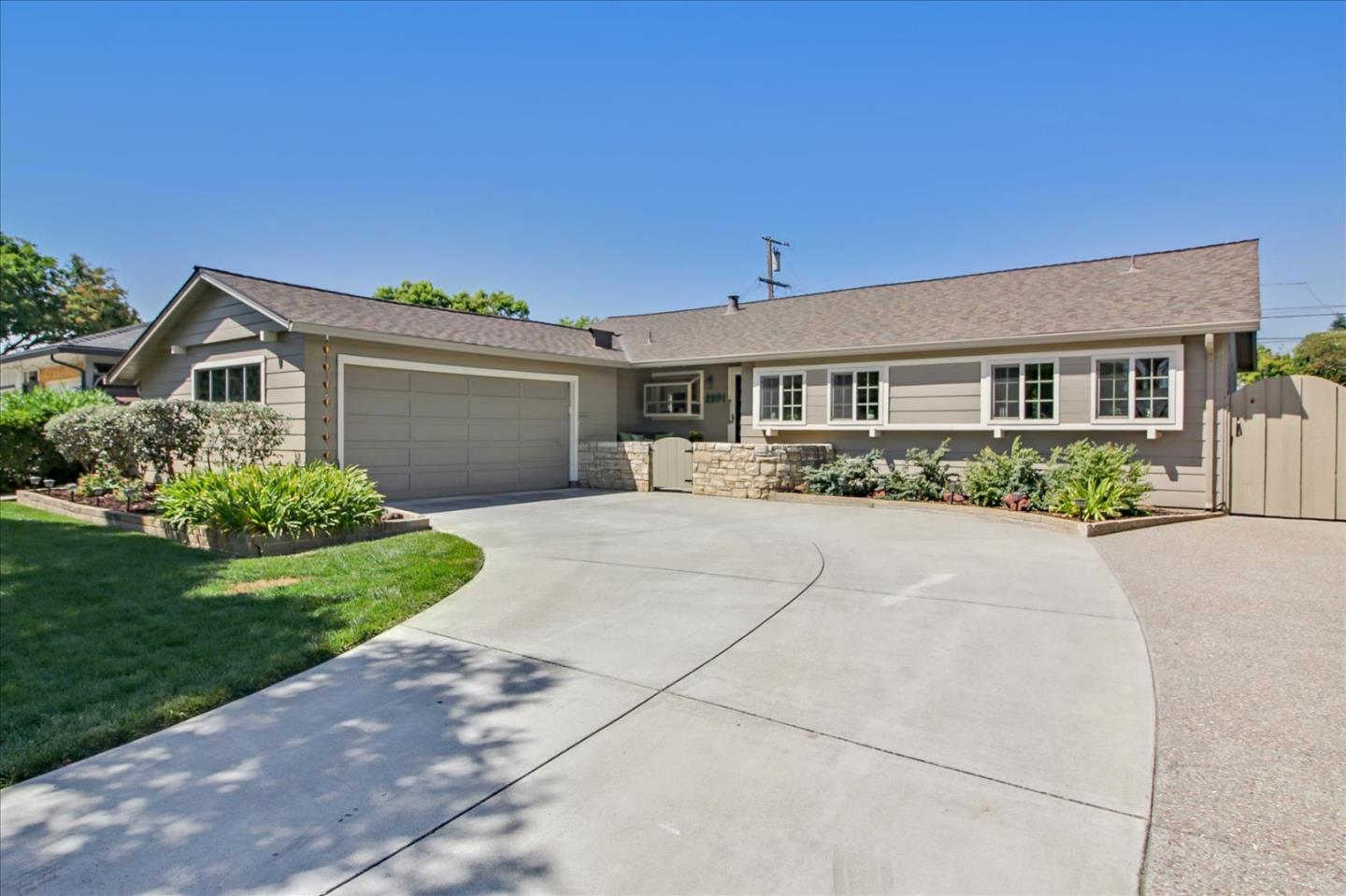 2891 Benjamin Avenue San Jose, CA 95124 - Photo 3 of 31 a front view of a house with a yard and outdoor seating