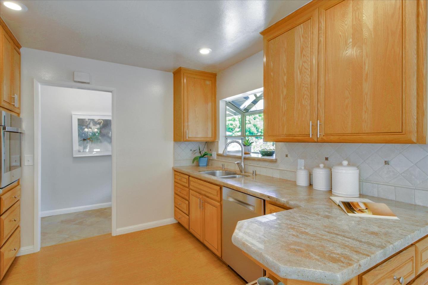 2891 Benjamin Avenue San Jose, CA 95124 - Photo 10 of 31 a kitchen with a sink a window and cabinets