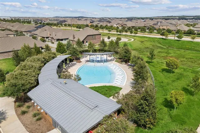 an aerial view of a house with a outdoor space