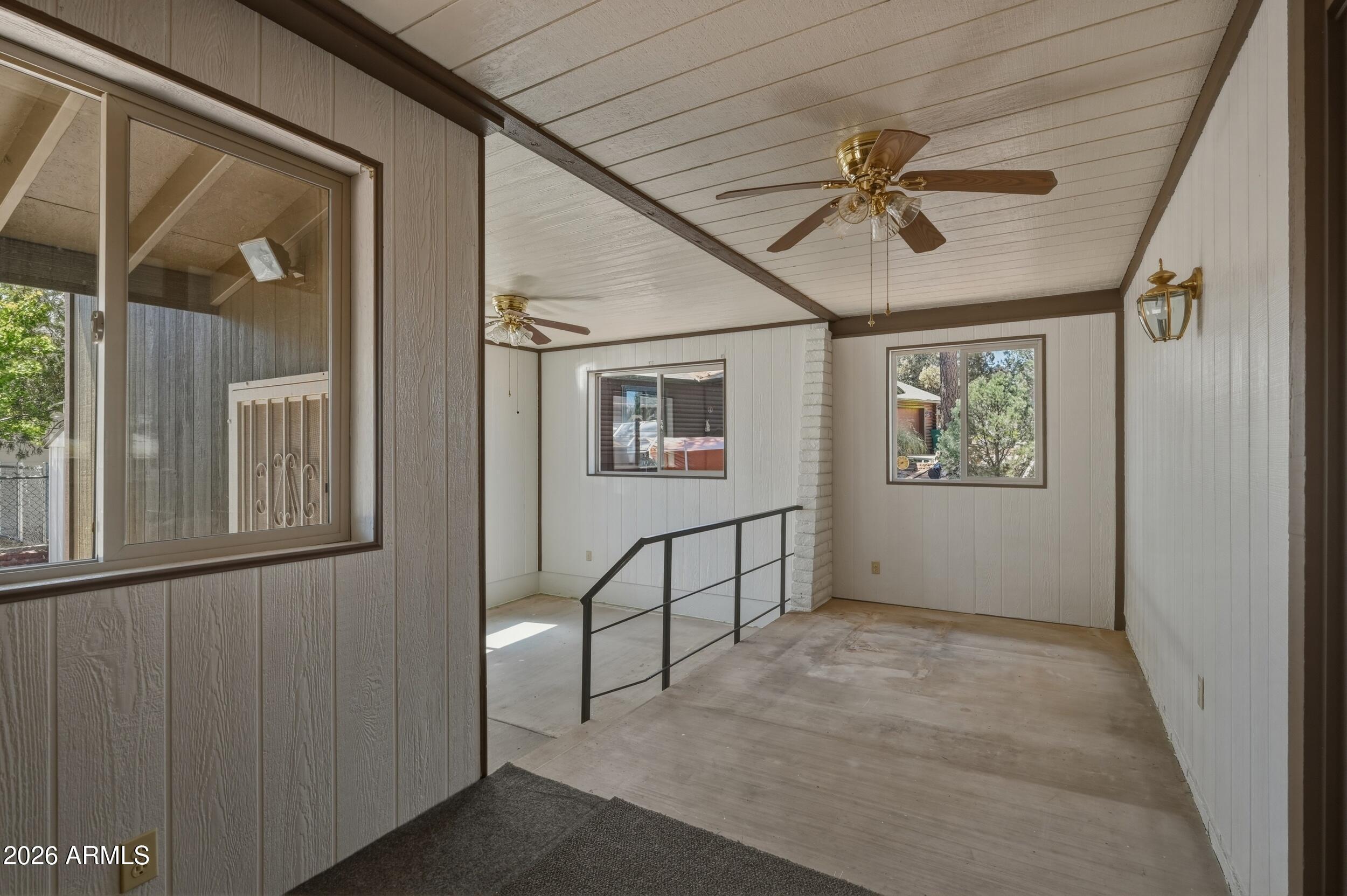 902 South Pineview Street Payson, AZ 85541 - Photo 15 of 32 a view of a hallway with workspace