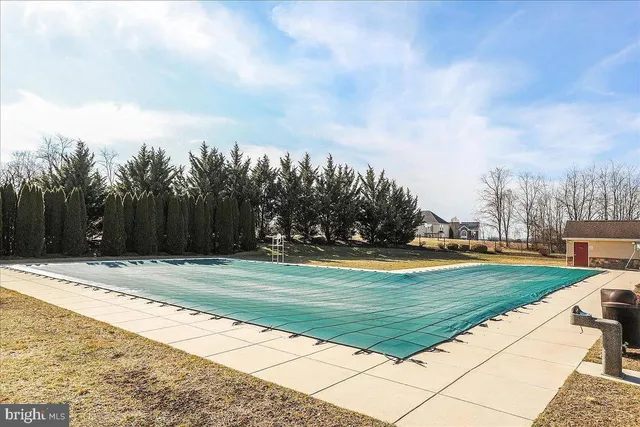 a view of a playground with basketball court
