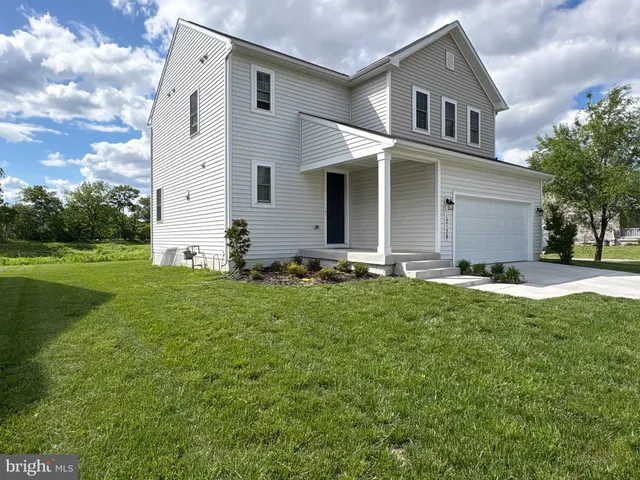 a front view of house with yard