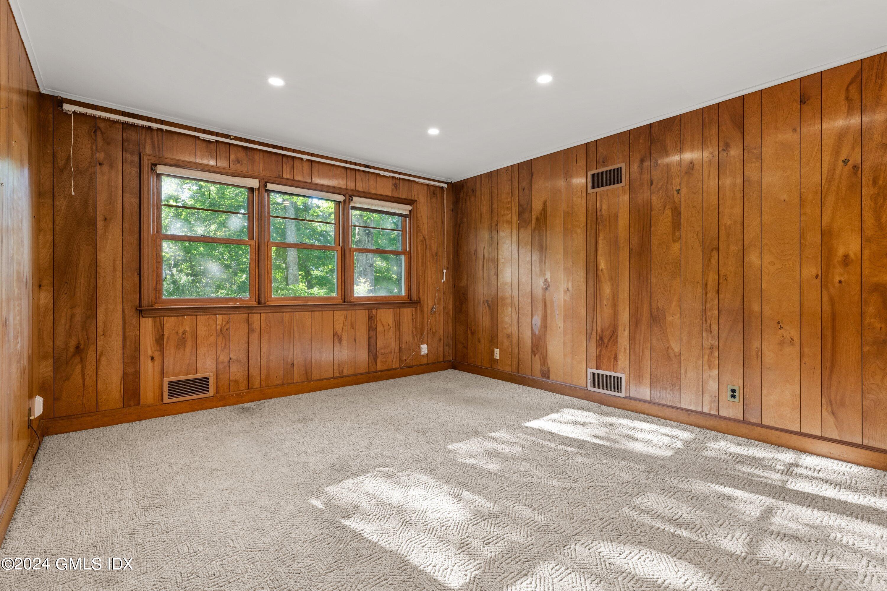 403 Stanwich Road Greenwich, CT 06830 - Photo 11 of 18 a view of an empty room with a window
