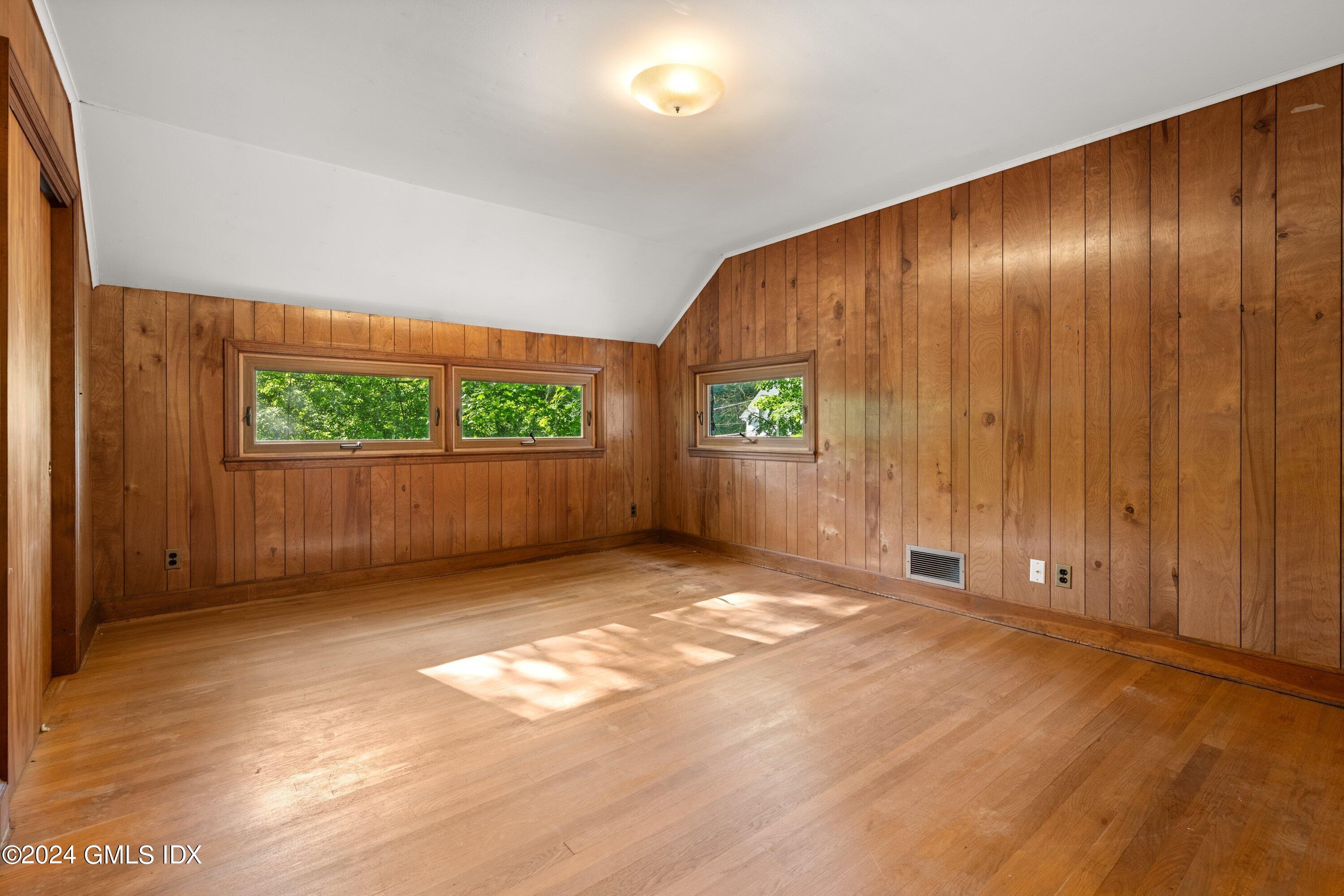 403 Stanwich Road Greenwich, CT 06830 - Photo 13 of 18 a view of an empty room with a window