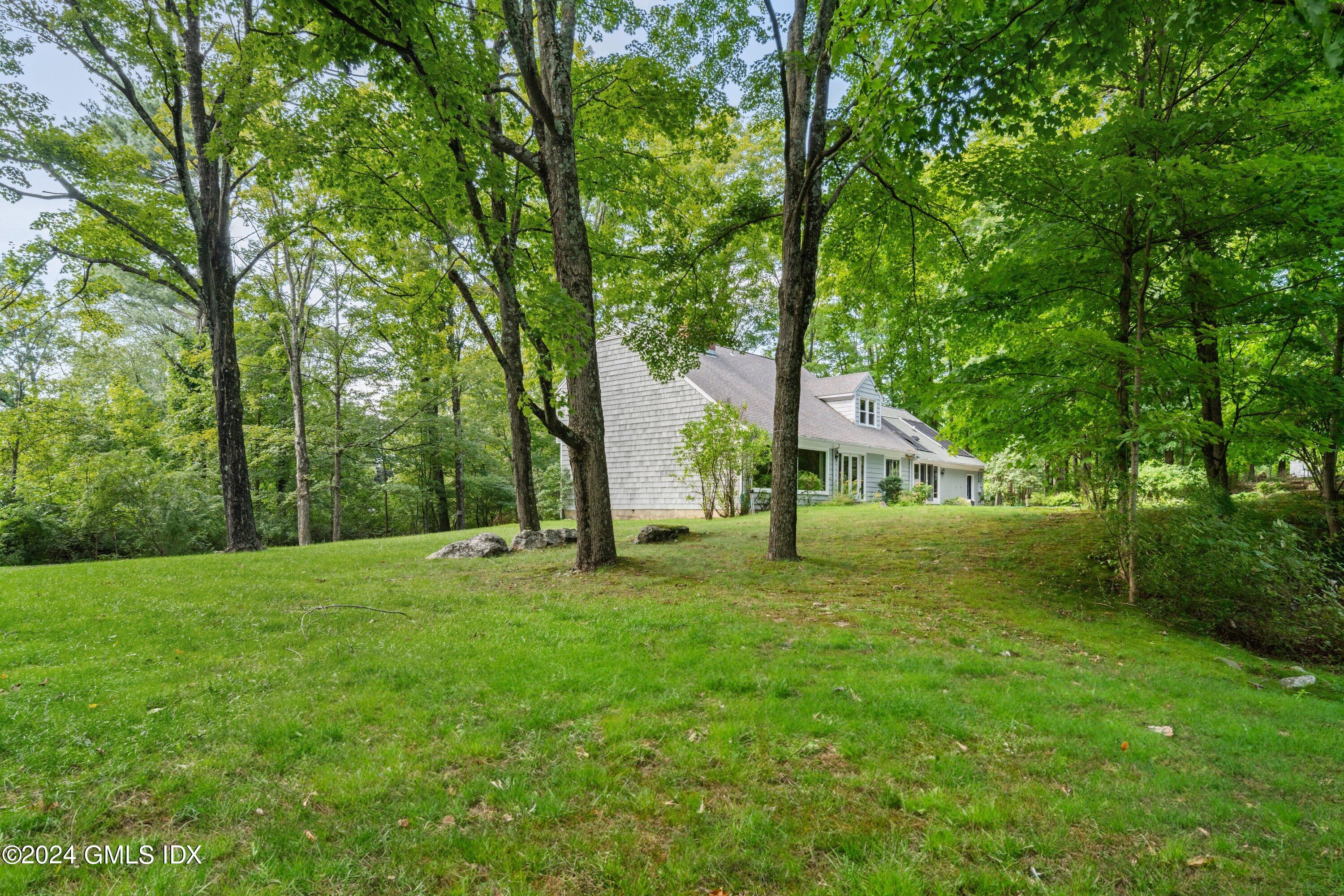 403 Stanwich Road Greenwich, CT 06830 - Photo 4 of 18 a view of a park with a tree