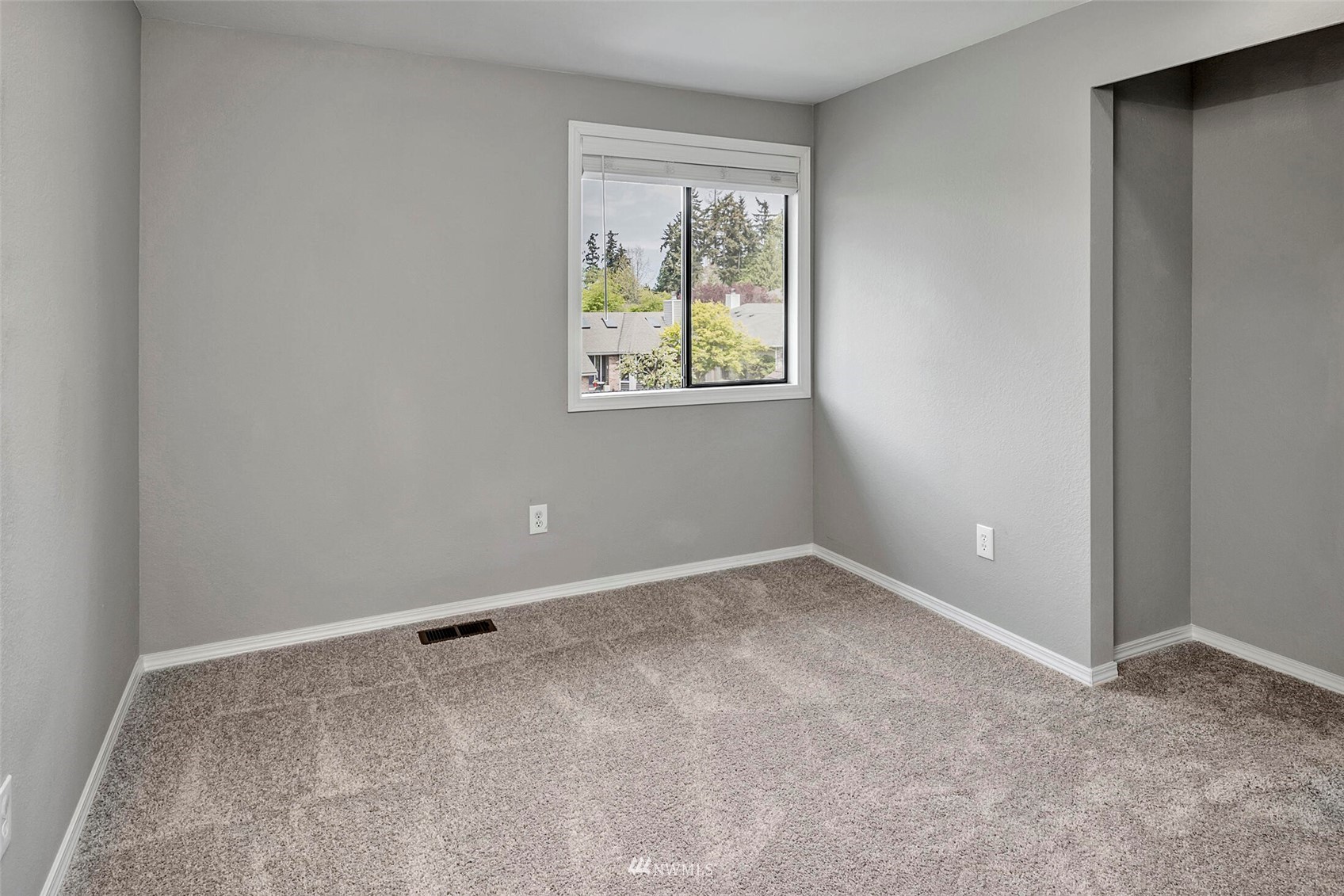 2002 238th Street Southeast Bothell, WA 98021 - Photo 30 of 40 an empty room with windows
